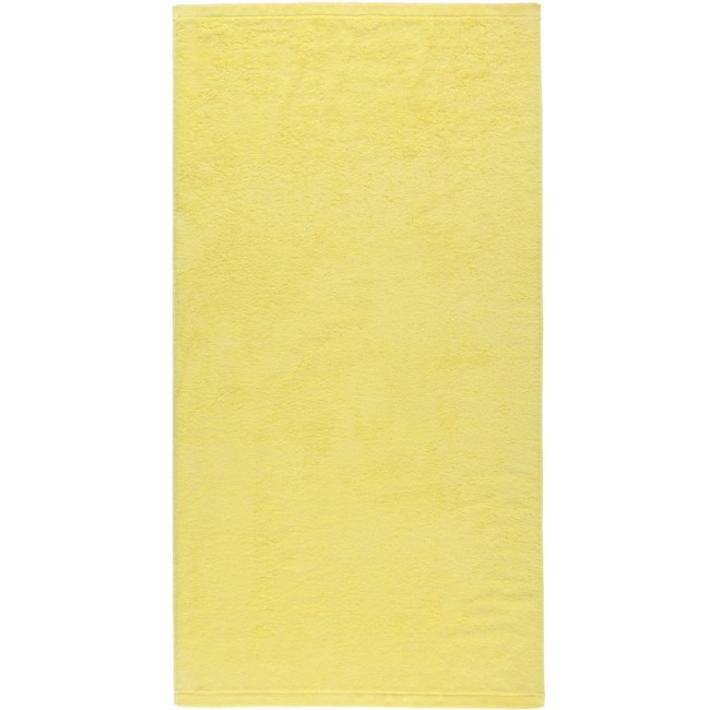Puszysty, miękki w dotyku, chłonny ręcznik bawełniany w rozmiarze 70x140 cm cytrynowy