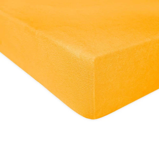 Prześcieradło frotte z gumką 40x90 w kolorze żółtym, leżące na białym tle. Tkanina ma delikatną, teksturowaną powierzchnię. Widoczne są zaokrąglone krawędzie oraz gumka, która zapewnia dopasowanie do materaca.