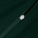 Zbliżenie na fragment pościeli frotte w kolorze zieleni butelkowej, ukazujący zamek błyskawiczny oraz miękką, teksturowaną powierzchnię materiału. Widoczny zamek w odcieniu białym.