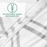 Pościel bawełniana 220x200 z wzorem szarej i białej kratki, rozłożona na płaskiej powierzchni. Widoczny uszyty zamek błyskawiczny na dolnej krawędzi. Tło jasne, jednolite, podkreślające detale materiału.