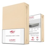 Prześcieradło jersey z elastanem w kolorze beżowym, rozmiar 90x200 cm, z gumką. Produkt opakowany z przodu, wyraźny napis PRZEŚCIERADŁO JERSEY Z GUMKĄ oraz logo DARYmex. Widoczna faktura materiału, zdjęcie na jednolitym tle.