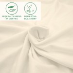 Prześcieradło jersey z elastanem w kolorze ekologicznym, miękka i delikatna tkanina, z gumką, rozłożone na gładkiej powierzchni, zbliżenie na fakturę materiału. Widoczne symbole dotyczące miękkości tkaniny.