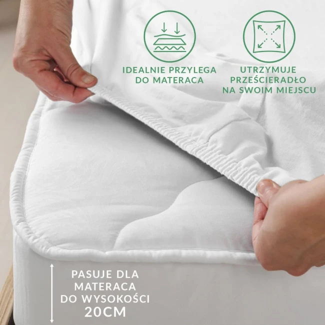 Prześcieradło flanelowe z gumką 140x200 w jasnoszarym kolorze, wykonane z materiału o gramaturze 160 g/m², leżące na materacu.