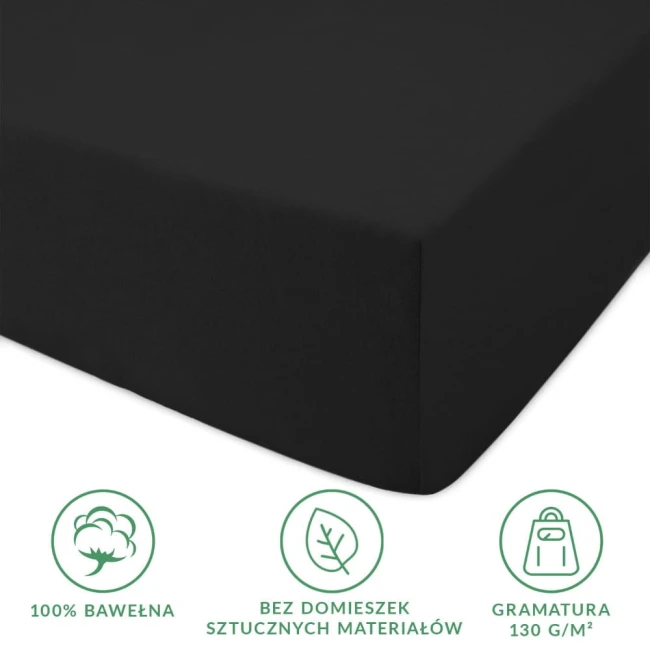 Prześcieradło jersey z gumką 180x200 w kolorze czarnym, wykonane z 100% bawełny, z widoczną gumką mocującą. Ujęcie z boku, pokazujące gładką fakturę materiału. W dolnej części widoczne ikony informujące o gramaturze i braku sztucznych domieszek.