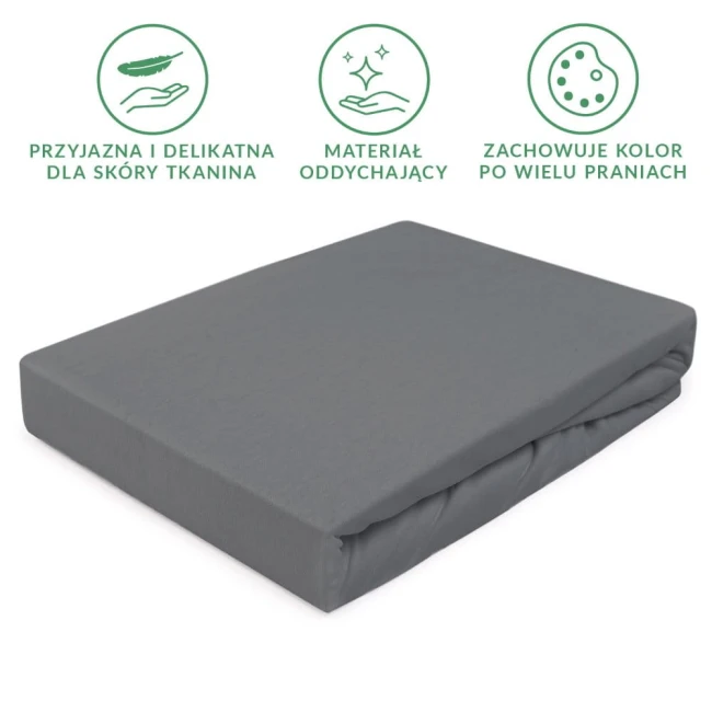 Prześcieradło jersey z gumką 180x200 w kolorze szarym, ułożone na płasko. Materiał jest elastyczny, gładki i matowy, idealnie dopasowujący się do materaca.