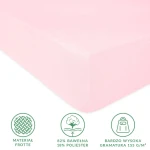 Prześcieradło frotte z gumką w kolorze róż kwarcowy, w rozmiarze 160x200 cm, leżące na płaskiej powierzchni. Widoczna tekstura materiału oraz informacje o składzie: 82% bawełna i 18% poliester. Biała etykieta z ikonami na dole zdjęcia.