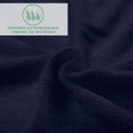 Prześcieradło frotte z gumką o wymiarach 180x200 cm w ciemnym granacie. Zbliżenie na miękką i teksturowaną powierzchnię materiału, podkreślając szczegóły struktury. Widoczne logo informujące o odporności na przecieranie i rwanie.
