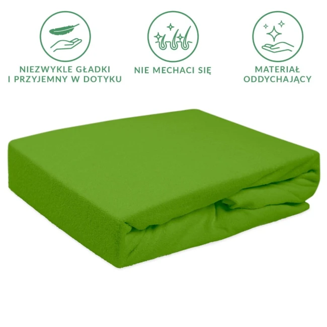 Prześcieradło frotte z gumką w kolorze kaktus, wymiary 200x220 cm. Materiał w jednolitym, intensywnym odcieniu zieleni, z miękką teksturą. Złożone, z widoczną gumką. Przeznaczone do użytku na łóżku, zapewniające komfort i oddychalność.