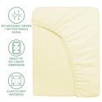 Prześcieradło frotte z gumką w kolorze kremowym, rozmiar 200x220 cm, z widocznymi detalami elastycznego materiału i grubej gumy, ułożone płasko na jednolitym tle. Widoczny jest obszyt po całym obwodzie oraz właściwości materiału.