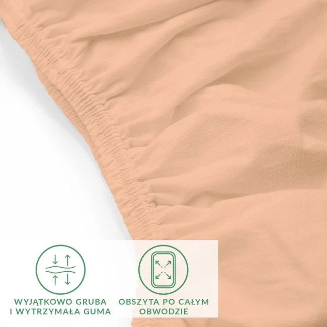 Prześcieradło jersey z elastanem w kolorze różowym, z gumką obszytą po całym obwodzie. Ujęcie z bliska, wykonane z miękkiego materiału, ukazujące detal elastycznej gumy oraz jego wygodne wykończenie. Szerokość 140 cm, długość 200 cm.