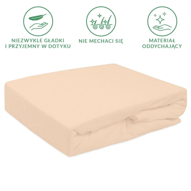 Prześcieradło frotte z gumką w kolorze różu perłowego, o wymiarach 160x200 cm, ułożone na boku, z widoczną teksturą materiału. Tło jednolite, bez zbędnych detali. Prześcieradło ma gładką powierzchnię i elastyczną gumkę, zapewniającą stabilność.