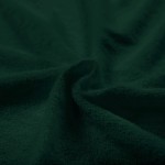 Poszewka frotte 40x40 w kolorze zieleni butelkowej, matowa faktura, złożona w sposób ukazujący jej miękkość i teksturę. Zdjęcie wykonane z bliska, skupione na detalu tkaniny. Brak widocznych napisów lub logo.
