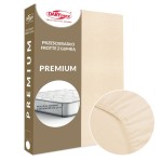 Prześcieradło frotte z gumką w jasnym beżu, rozmiar 200x220. Ujęcie frontalne na opakowanie, widoczna faktura materiału oraz detal gumki. Oznaczenie „PREMIUM” i informacja o dopasowaniu do materaca wysokiego do 25 cm. Tło jasne, neutralne.