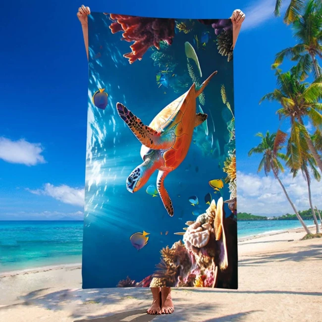  Bardzo duży, szybkoschnący, plażowy ręcznik z mikrofibry, w żółwia pływającego w oceanie w rozmiarze 100x180 cm 
