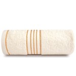 Komplet ręczników bawełnianych w kolorze ecru, z bordiurą w złote paski. Oferowane w eco pudełku, gramatura 500 g/m². Ręczniki zwinięte, prezentujące miękką teksturę i elegancki wygląd.