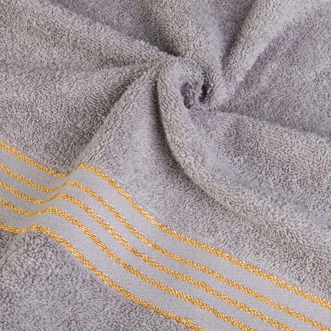 Komplet ręczników z bawełny w eco pudełku szary i ciemny szary z bordiurą w złote paski 500 g/m2 TIWANO 4 kpl.