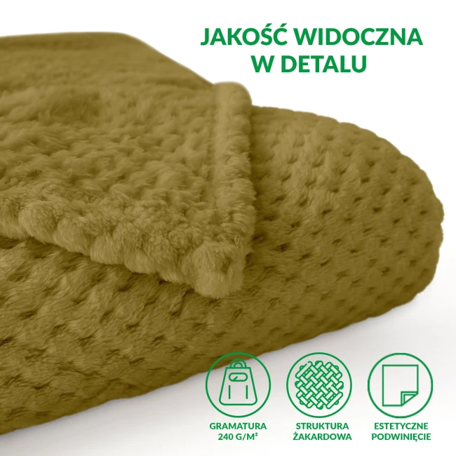 Koc żakardowy 150x200 w kolorze oliwkowym, z fakturą o delikatnych wypustkach. Leży na białym tle, z widocznym złożonym rogiem. Wymiary i miękki materiał podkreślają jego funkcjonalność jako dodatku do wnętrz.