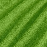 Poszewka frotte 40x80 w kolorze zielonym, o gładkiej, teksturowanej powierzchni. Ujęcie w zbliżeniu, pokazujące szczegóły faktury materiału. Idealna do dekoracji lub ochrony poduszek.