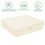 Prześcieradło frotte z gumką w kolorze ecru, o wymiarach 80x180 cm, leżące na płasko. Materiał o miękkiej, gładkiej fakturze, idealne do zakrycia materaca.